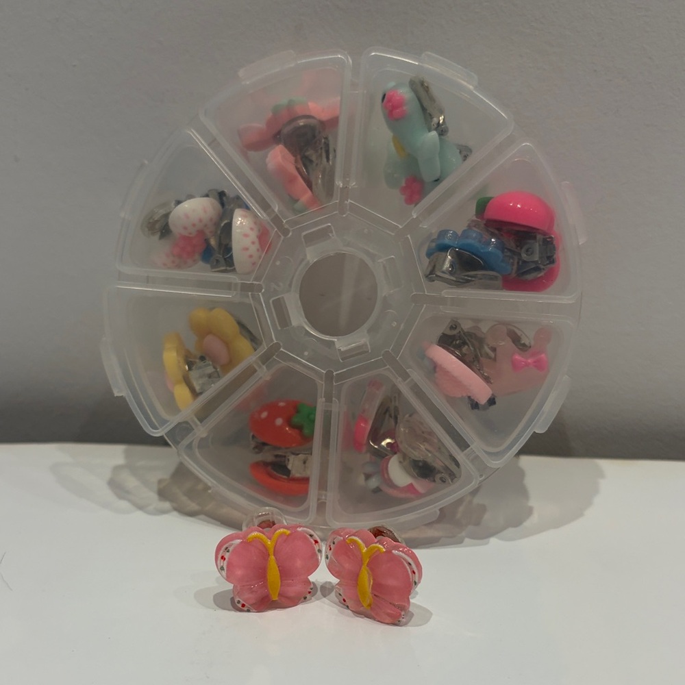 Cute set of clip on earrings in case